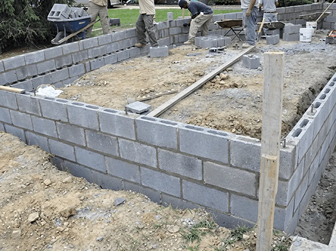 Professionals building a foundation with blocks in Chandler, AZ
