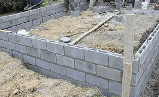Professionals building a foundation with blocks in Chandler, AZ
