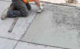 Professional repairing a concrete floor in Chandler, AZ