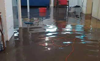 Basement with boiler, cabinets and washing machine completely flooded in Chandler, AZ